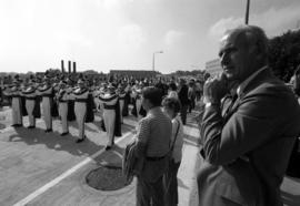 Brendan McDonald watches the marching band at the parade opening the new University Bridge, St. Cloud State University