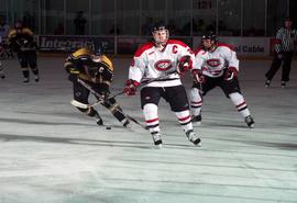 Action during a hockey game against Michigan Tech University, St. Cloud State University