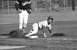 Joe Martin slides into third base during a St. Cloud State University baseball game against Augsburg College