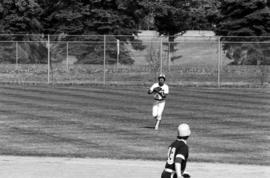 Jim Eisenreich catches a baseball during a St. Cloud State University baseball game