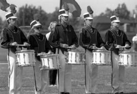 Marching band performs at a football game, St. Cloud State University