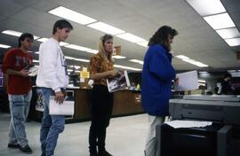 Students use a photocopier at Centennial Hall (1971), St. Cloud State University