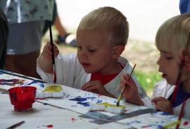 Children paint artwork, Lemonade Concert and Art Fair, St. Cloud State University