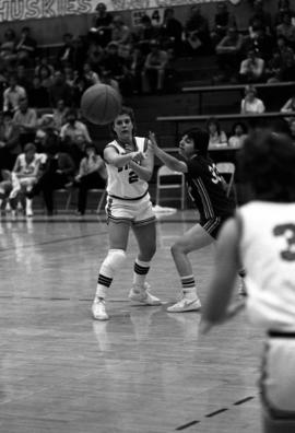 Dawn Anderson passes a ball during a basketball game against the University of Wisconsin-LaCrosse, St. Cloud State University