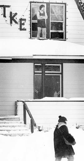 Don Perry stands outside of the Tau Kappa Epsilon house, St. Cloud State University