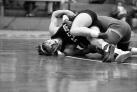 Wrestler Dennis Moske during a match, St. Cloud State University