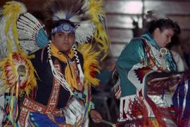 Two people dance at pow wow, St. Cloud State University