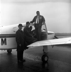 Rowland Anderson, Philip Tideman, Jim Gonsior, and Denny Drake with the Aero Club's new Beechcraft Muskateer plan, St. Cloud State University