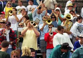 Band plays in the stands at a football game, St. Cloud State University