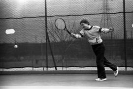 Jerry Anderson plays tennis, St. Cloud State University