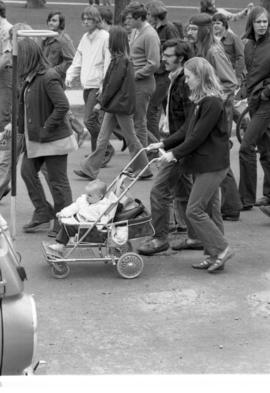 A woman marches, Day of Peace protest, St. Cloud State University