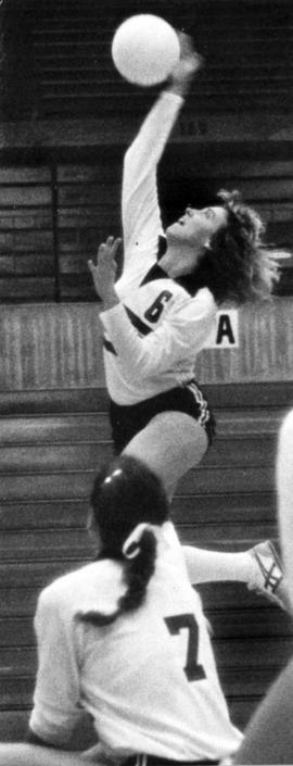 St. Cloud State University volleyball player Lori Seman spikes the ball against the University of Minnesota