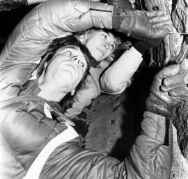 Mark Polas and Carole Hornby search for bats in a sewer, St. Cloud State University