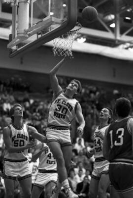 Eric Lind drives to the basketball hoop during a game against Moorhead State University, St. Cloud State University