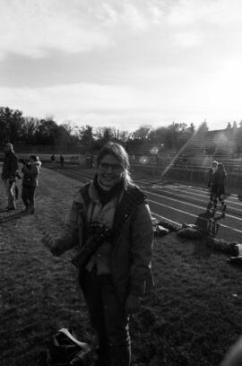 Woman at football game, St. Cloud State University