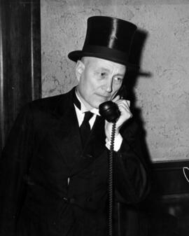 Dudley Brainard talks on the telephone, St. Cloud State University