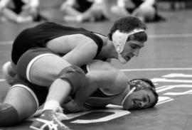 St. Cloud State wrestler Richie Douglas competes against the University of Wisconsin-River Falls' Mike Mueller