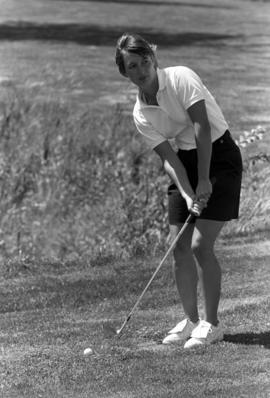 Anne Abicht gets ready to hit a golf ball at the SCSU Women's Athletics Golf Classic fundraiser, St. Cloud State University