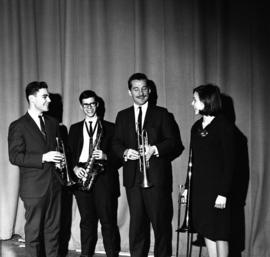 Doc Severinsen practices with students Jeff Rudolph, Ken Melich, and Anna Mae Stepan, St. Cloud State University