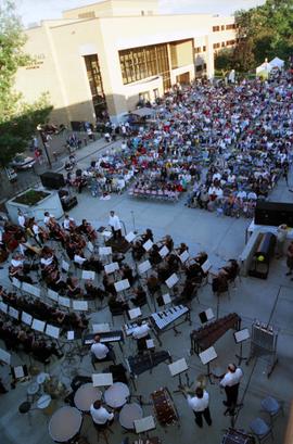 People watch an orchestra play, Lemonade Concert and Art Fair, St. Cloud State University