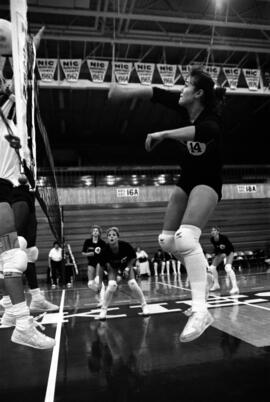 Kathy Davis hits a volleyball during a volleyball match, St. Cloud State University