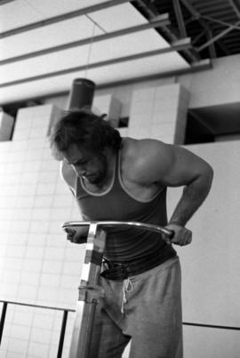 Paul Ellering lifts weights, St. Cloud State University