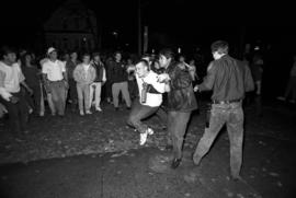 Man is apprehended during the homecoming riot, St. Cloud State University