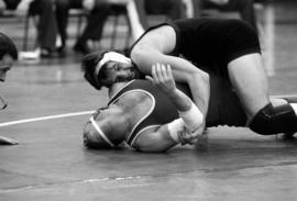 St. Cloud State wrestler Richie Douglas competes against the University of Wisconsin-River Falls' Mike Mueller