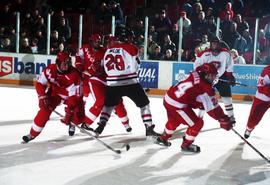 Action during a hockey game against the University of Wisconsin, St. Cloud State University