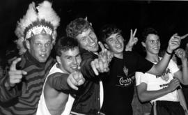 Students celebrate in front of Sherburne Hall (1969) the Minnesota Twins winning the American League West division, St. Cloud State University