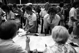 Students register for classes in Halenbeck Hall (1965), St. Cloud State University