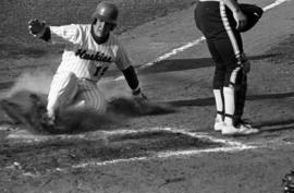 Paul Thielen slides at home plate during a St. Cloud State University baseball game against Southwest State University