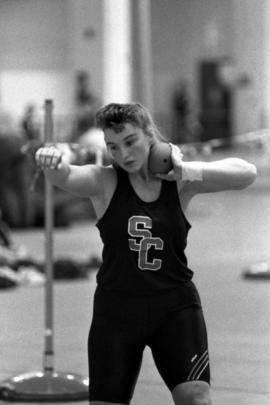 St. Cloud State University athlete Sandy Dingmann prepares to throw a shot put