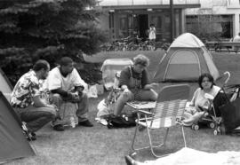 People gather at the MEChA hunger strike site, St. Cloud State University