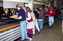 People are served food at Garvey Commons (1963), St. Cloud State University