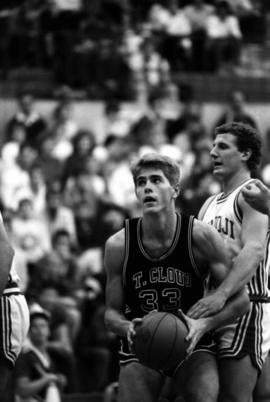 Basketball player Kent Lind during a game against Bemidji State University, St. Cloud State University