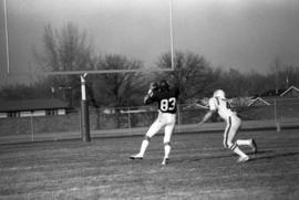 St. Cloud State receiver Mike Mullen catches a football during a game against Winona State University