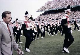 Doc Severinsen and the St. Cloud State marching band perform at Met Stadium during halftime of a Minnesota Vikings football game, St. Cloud State University