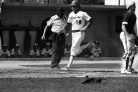 Jim Eisenreich scores during a St. Cloud State University baseball game against the University of Minnesota-Duluth