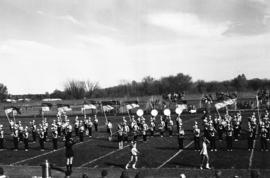 Marching band performs at a homecoming football game