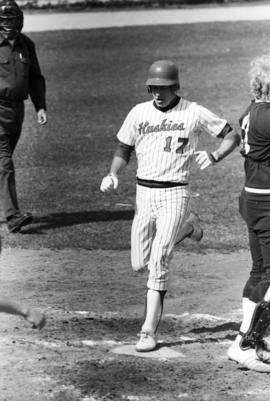 Bob Hegman scores during a St. Cloud State University baseball game