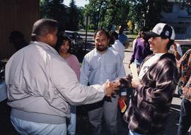 Students greet each other, St. Cloud State University