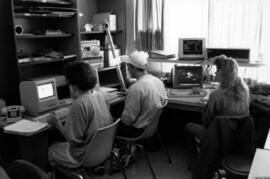 Students sit together using computers, St. Cloud State University