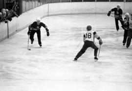 St. Cloud State hockey player Dan Pratt skates with the puck against the University of Alaska-Fairbanks