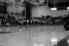 Cheerleaders perform at the St. Cloud State men's basketball game against Morningside College