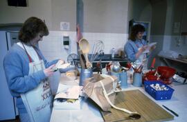Students cook in kitchen, Alnwick Castle, St. Cloud State University