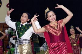 Dancers perform at Hmong Night at Halenbeck Hall (1965), St. Cloud State University