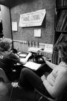 Women answer telephones during the KVSC trivia weekend, St. Cloud State University
