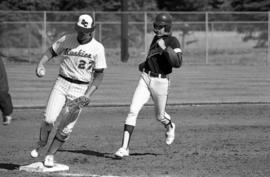 Scott Mansch tags third base during a St. Cloud State University baseball game against Augsburg College