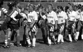 Soccer players shake hands after a game, St. Cloud State University